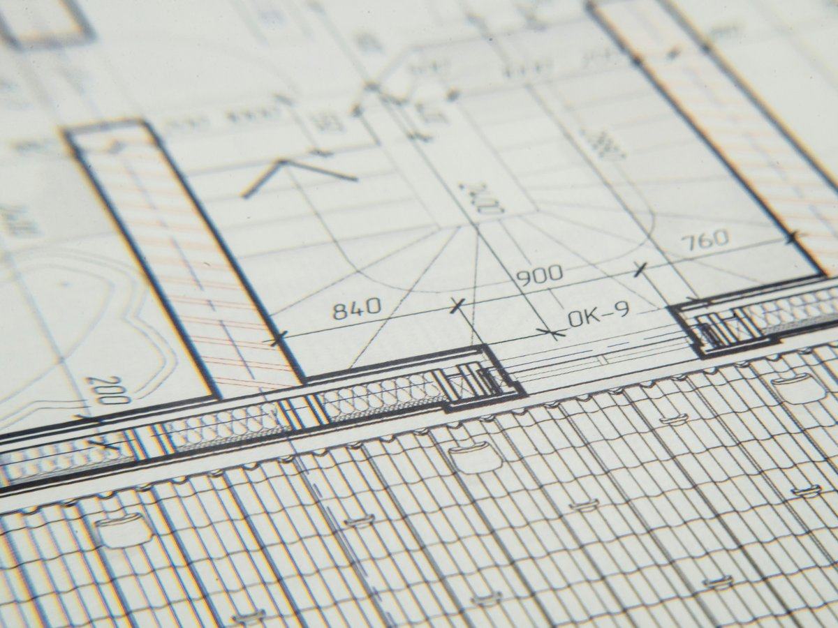 finance-strategy — page_hero background_image — pexels:architectural blueprint technical drawing overhead