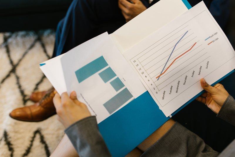 finance — image_text image — pexels:CFO finance team reporting discussion executive me