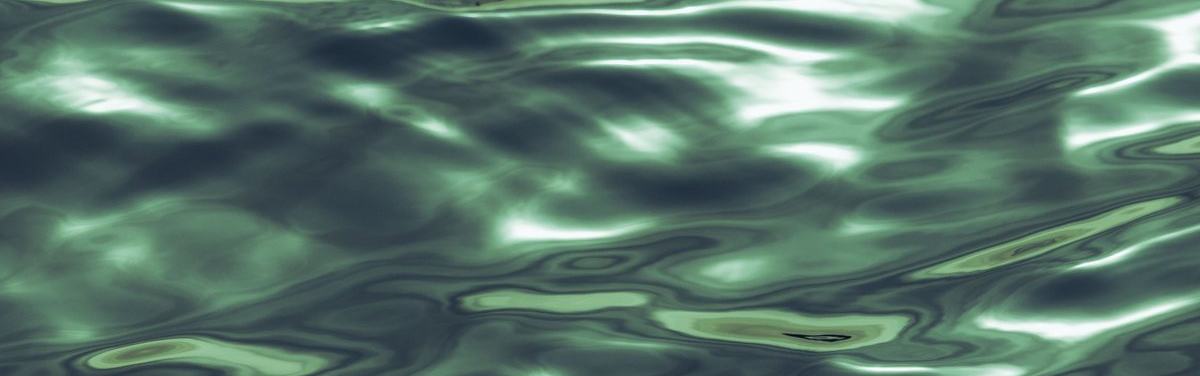 finance — page_hero background_image — pexels:liquid mercury surface dark metallic ripple abstra