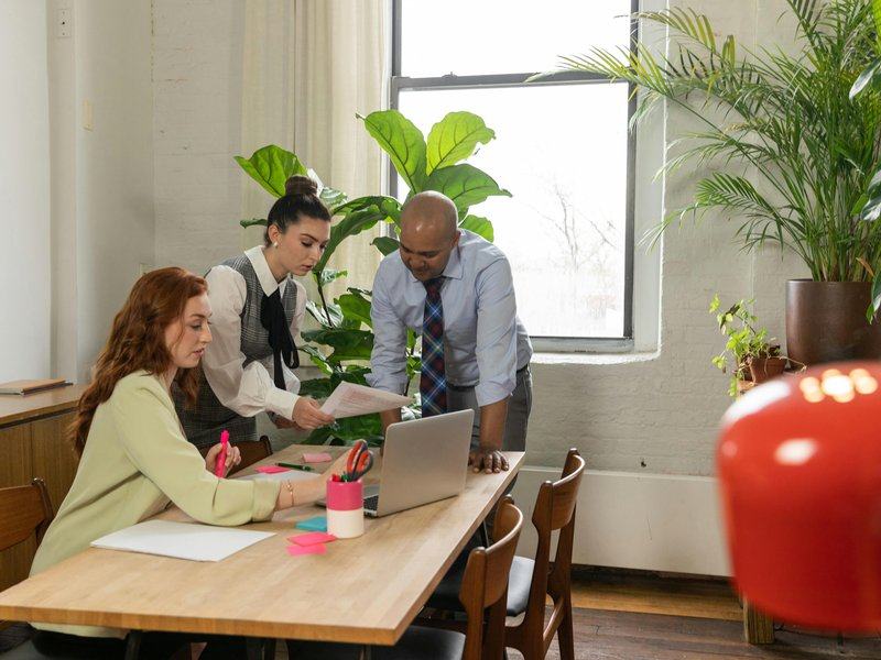 operating-model — sibling_links image — pexels:team structure review discussion executive profess