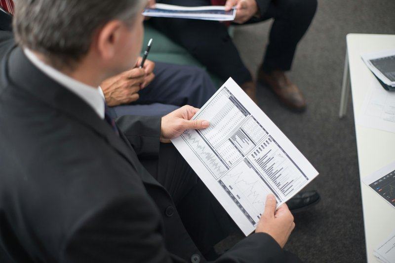 performance-management — image_text image — pexels:management reporting review meeting executive scre