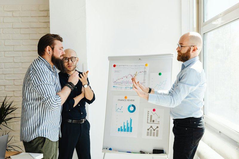 planning-budgeting-and-forecasting — image_text image — pexels:budget review scenario analysis finance team white