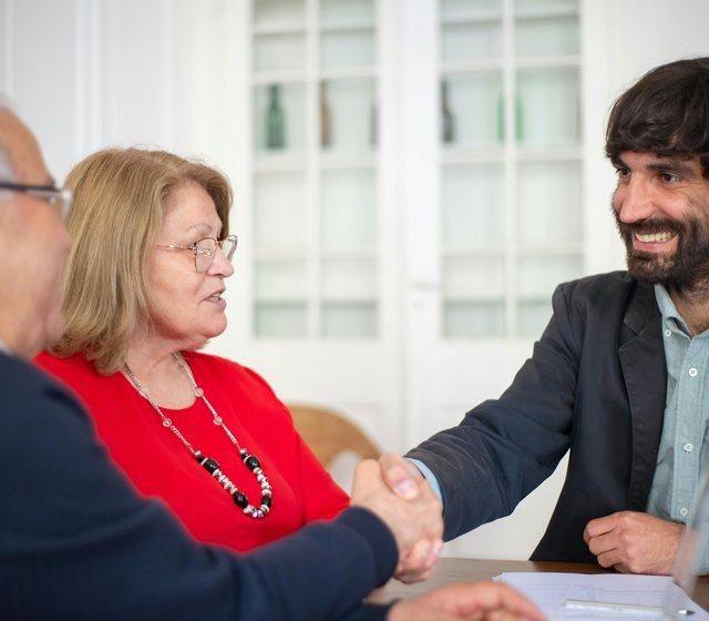 strategy — cta_image image — pexels:senior advisor one-on-one strategic client discuss